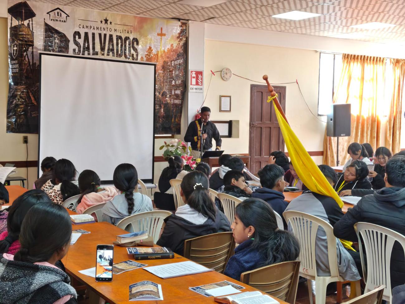 Pastor Juan Caballero teaching about Salvation.
