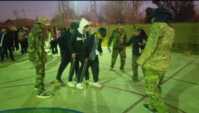 Young people coordinating steps to reach the goal together.